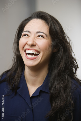 Photo: Young woman laughing Young woman laughing