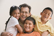 Family smiling for the camera