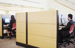 Executives working in cubicles