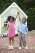 Children holding hands up
