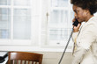 Woman speaking on phone