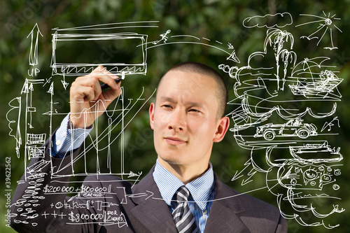 Photo: Businessman Writing Something Outdoors Businessman Writing Something Outdoors