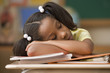 Student sleeping at her desk