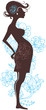 Silhouette of pregnant woman in flowers
