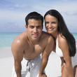 Couple smiling on the beach