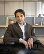 Businessman smiling in office space