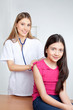 Foto: Doctor Examining Child in Clinic Doctor Examining Child in Clinic