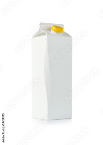 Photo: Blank milk box isolated on white background Blank milk box isolated on white background
