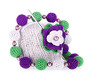 Ball of cotton knitting yarn with knitted flower and necklace