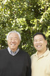 Senior Asian father with grown son