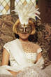 Portrait of a young woman wearing an eye mask