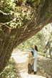 Hispanic mother and son on nature trail