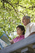 Senior couple with map outdoors