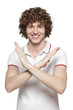 Smiling male making stop sign on white background