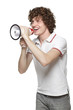 Happy man making announcement over megaphone