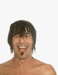 Man laughing in shower