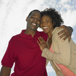 Low angle view of African couple smiling