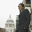 African businessman smiling in urban area