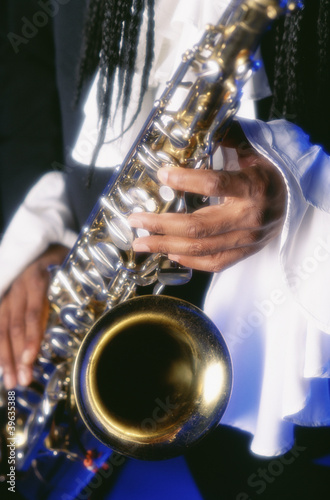 Photo: Close up of man playing saxophone Close up of man playing saxophone