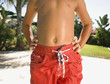 Close up of boy wearing swimsuit