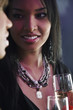 Portrait of African woman holding cocktail