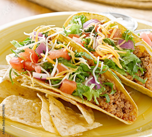 Photo: Tacos on a platter with tortillas - mexican food Tacos on a platter with tortillas - mexican food