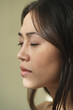 Profile of Asian woman with eyes closed