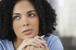 African businesswoman thinking