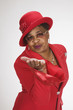 African woman blowing kiss