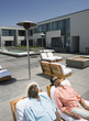 Senior African couple relaxing in deck chairs