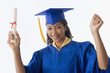 African American woman wearing graduation cap and gown