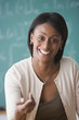 African American female teacher with hand extended