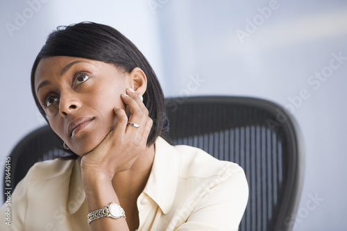 Photo: African American businesswoman thinking African American businesswoman thinking