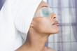 African American woman wearing gel eye mask