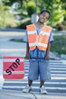 Portrait of boy on cross walk duty