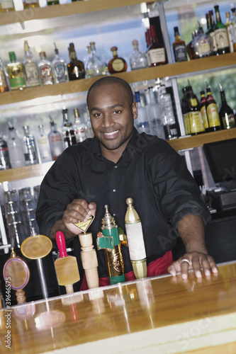 Photo: Portrait of male bartender Portrait of male bartender