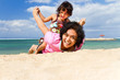 Asian mother and child fun play at the beach Asian mother and child fun play at the beach