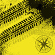 Yellow tire tracks with wind rose