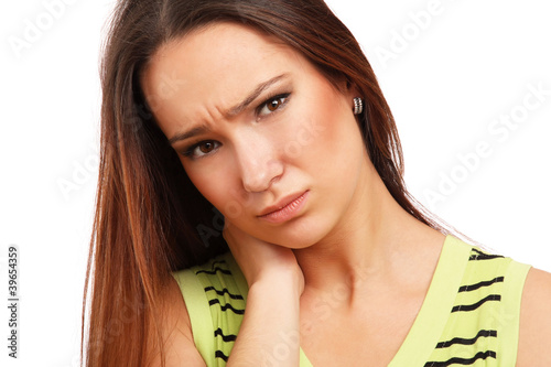 Photo: Portrait of a beautiful brunette with migraine Portrait of a beautiful brunette with migraine