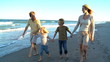 Video: Family Group Walking Home Along the Beach Family Group Walking Home Along the Beach