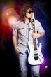 cute young rock musician with a white guitar