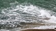 Sea waves on the rocky beach
