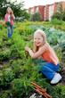 girls working in vegetable garden
