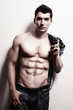 Sexy masculine man with muscular abs