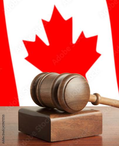 Photo: Gavel and Flag of Canada Gavel and Flag of Canada