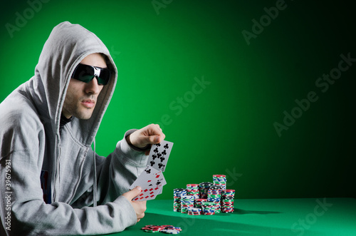 Photo: Man playing in the casino Man playing in the casino