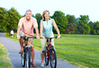 Senior couple cycling.