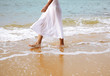 woman walking at beach woman walking at beach