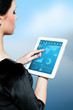 Cute brunette using interface of new touch pad device