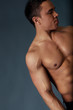 Sexy naked torso, hand and head of fit and neat young man